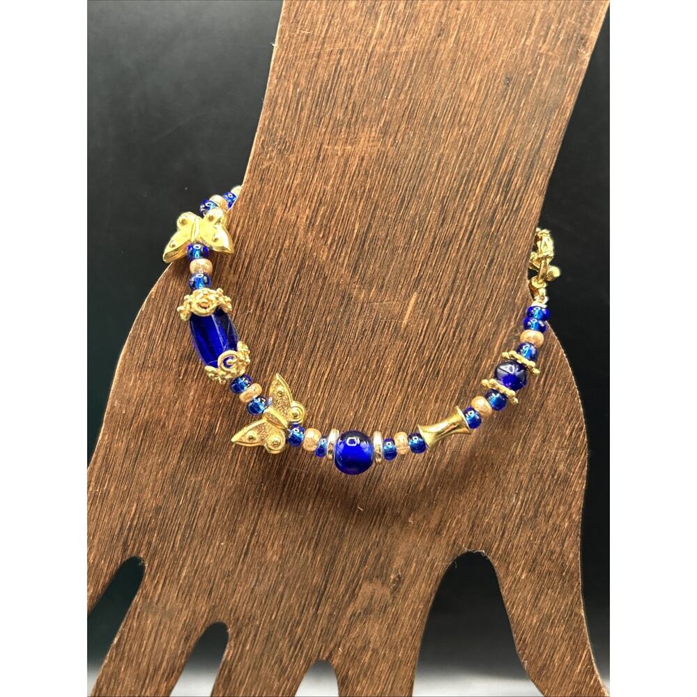 Beaded Bracelet Size 6.5 with Blue Glass And Gold tone Metal Toggle Closure